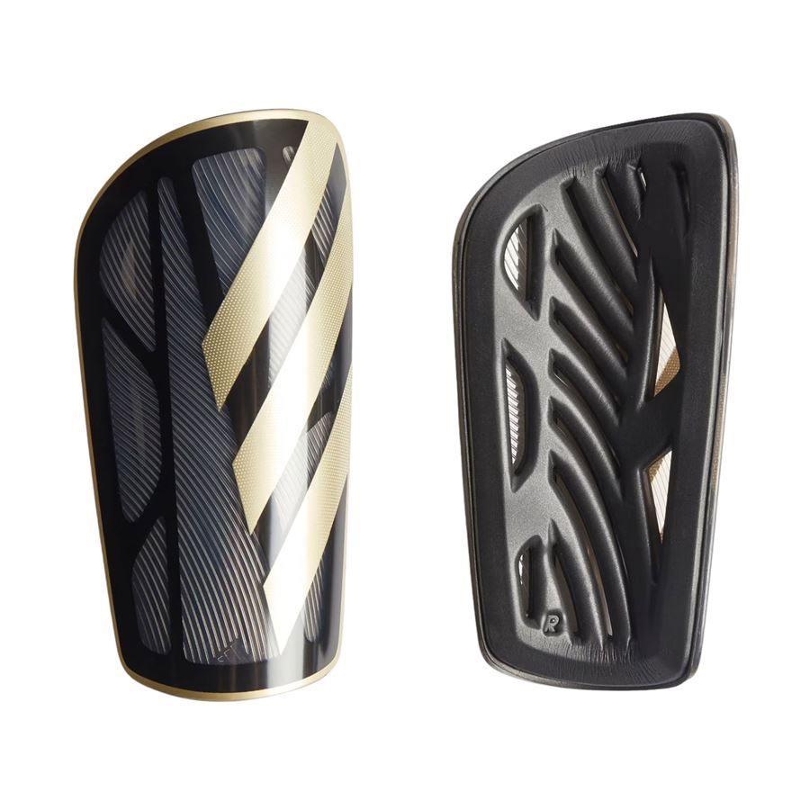 TIRO SG LGE Parastinchi con fasce a compressione. Adidas | IP4000X